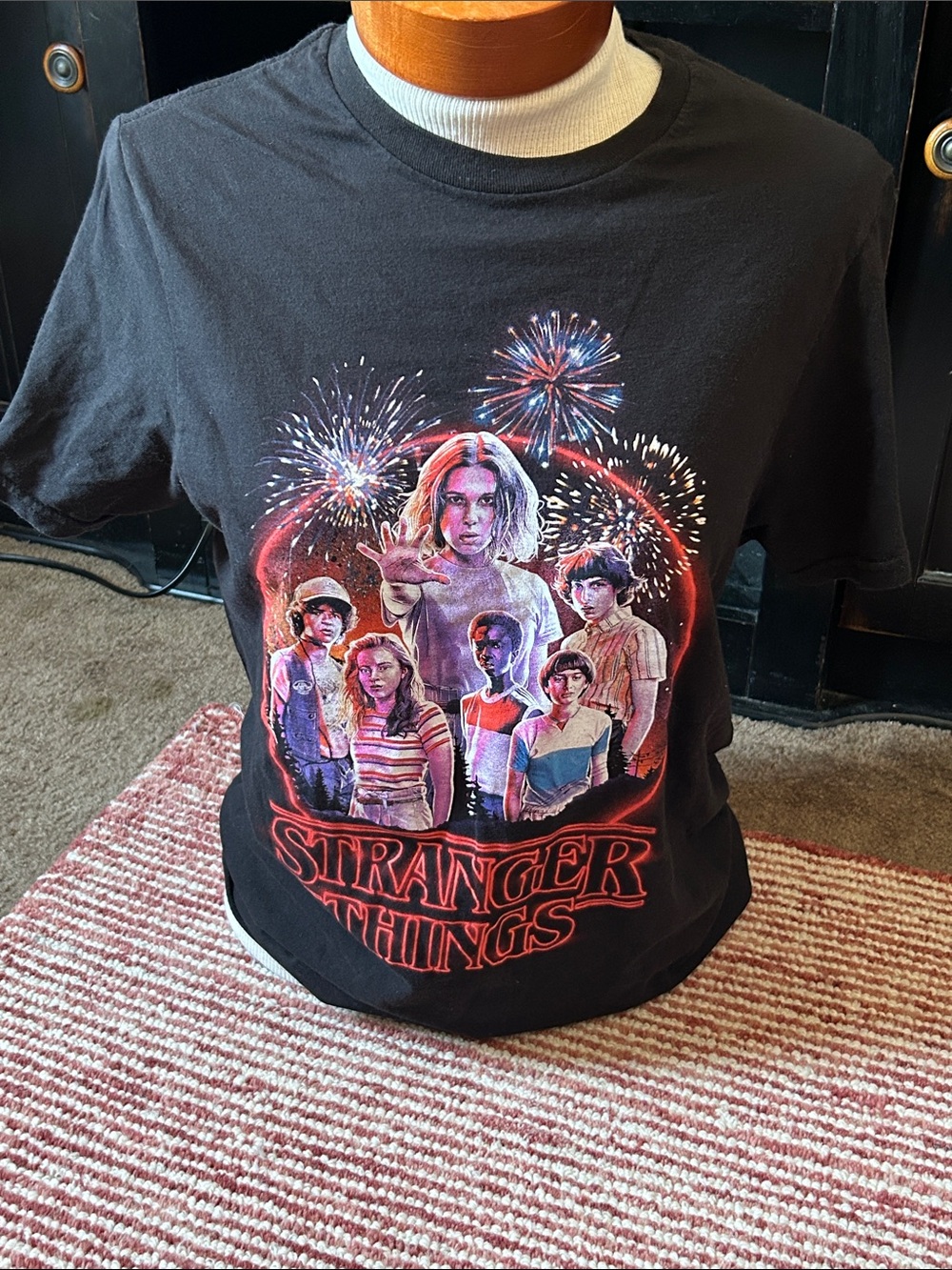 Netflix Black Tee with Red, Pink, Blue and Purple Character Design